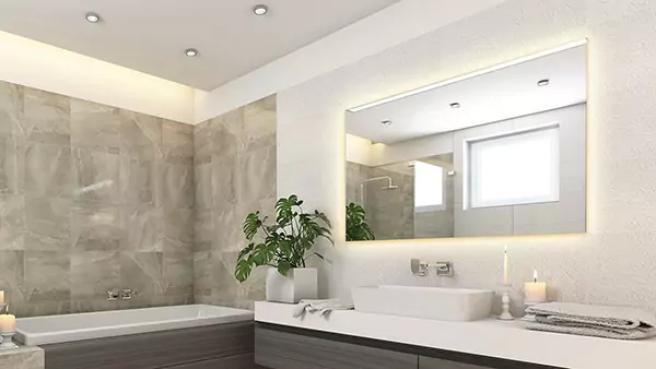 Thumb of the wall above the bathroom sink, frameless backlit mirrors are mounted from Kuwait.