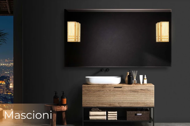 A black wall features a frameless bathroom mirrors and lights with a Mascioni bulb from Ajman.