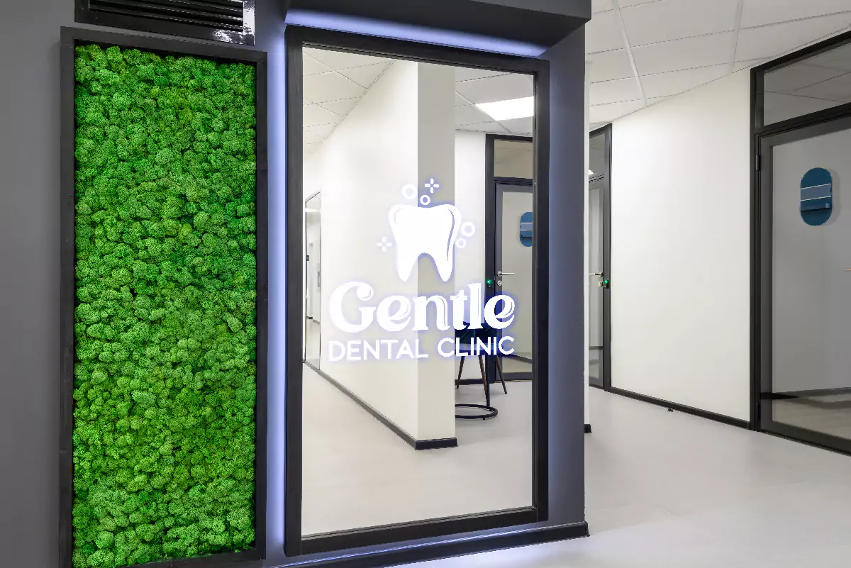 A full wall backlit led for mirror featuring the logo of gentle dental clinic from Qatar.